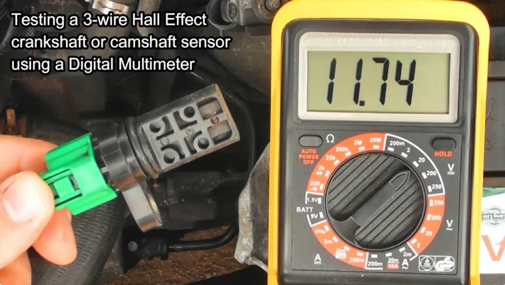 Back-probing a Hall-effect crankshaft position sensor to test power, ground and signal